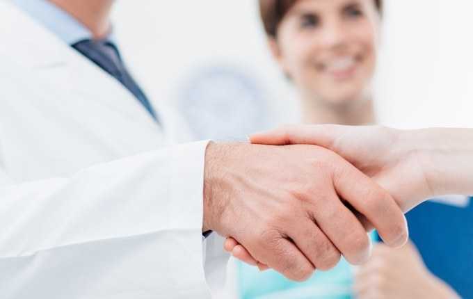 A close-up image of a handshake.