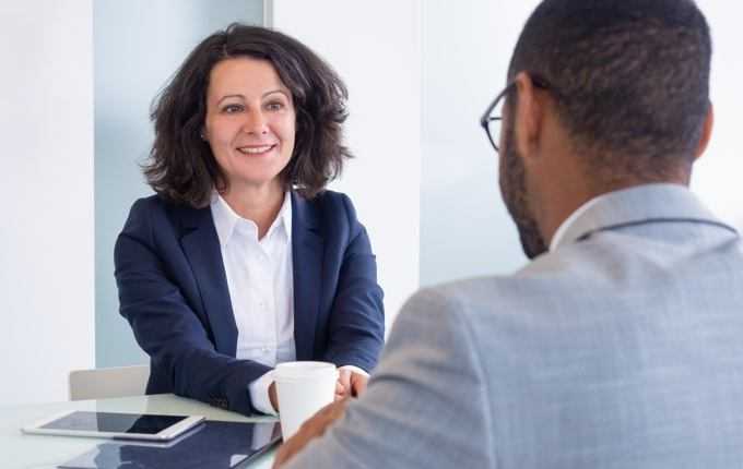 An interview between a man and a woman.